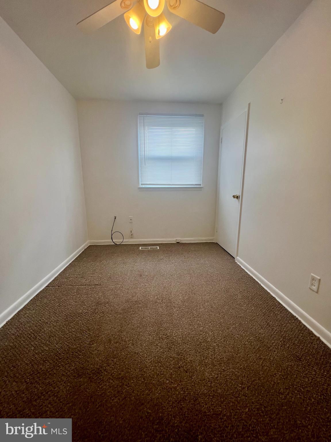 1635 Griffith Street Philadelphia, PA 19111 - Photo 16 of 17 an empty room with a empty space and windows