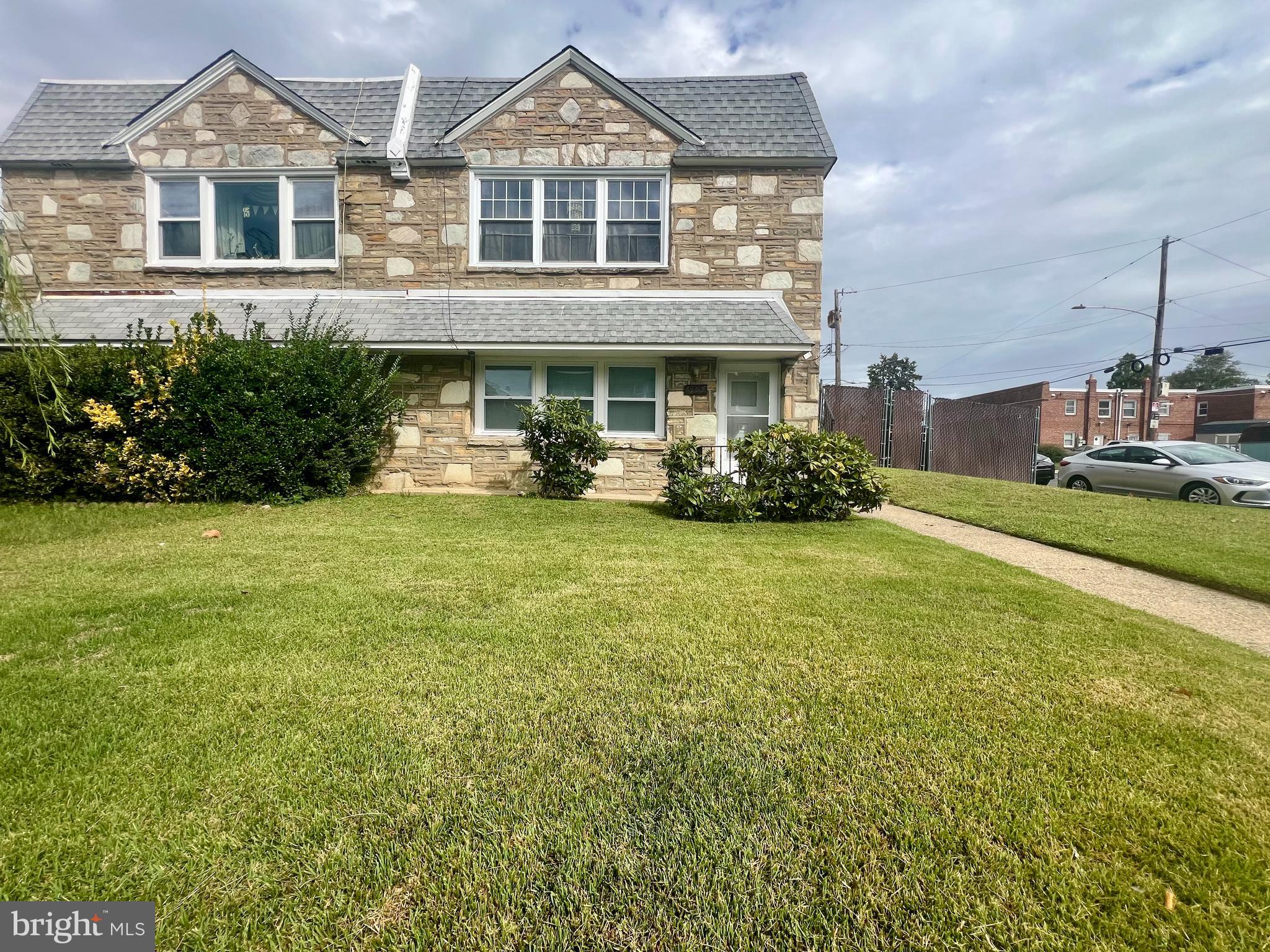 1635 Griffith Street Philadelphia, PA 19111 - Photo 2 of 17 a front view of a house with a yard