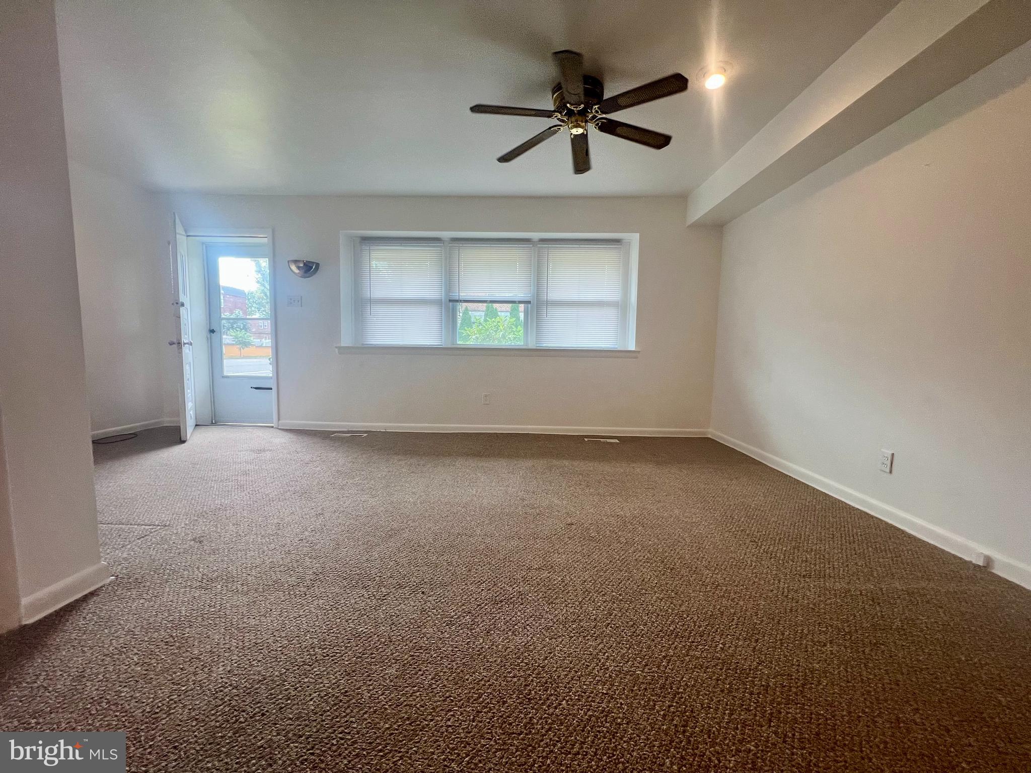 1635 Griffith Street Philadelphia, PA 19111 - Photo 7 of 17 an empty room with a empty space and windows