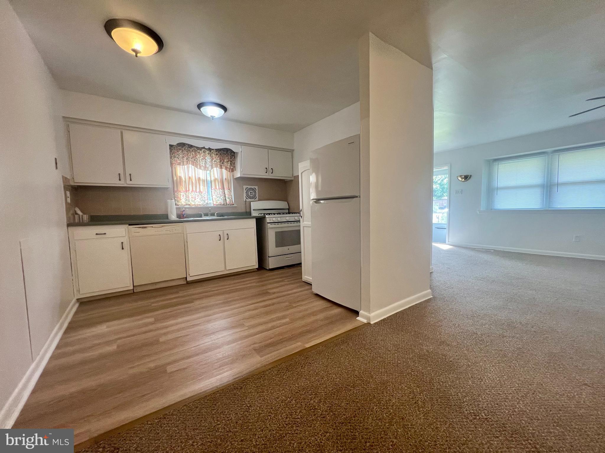 1635 Griffith Street Philadelphia, PA 19111 - Photo 8 of 17 a large kitchen with cabinets and stainless steel appliances