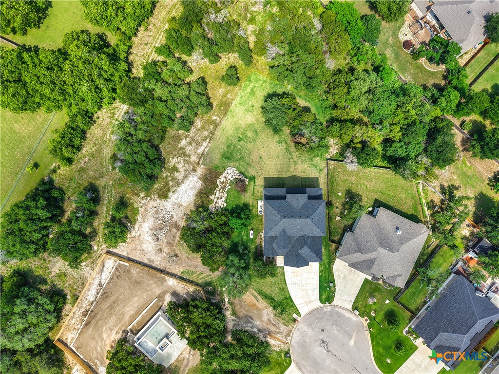 2136 Oak Draw Court Belton, TX 76513 - Photo 46 of 46 an aerial view of a house with garden space and street view