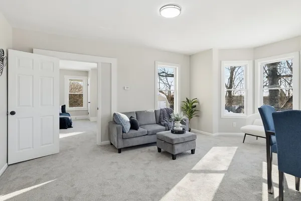 a living room with furniture and a couch