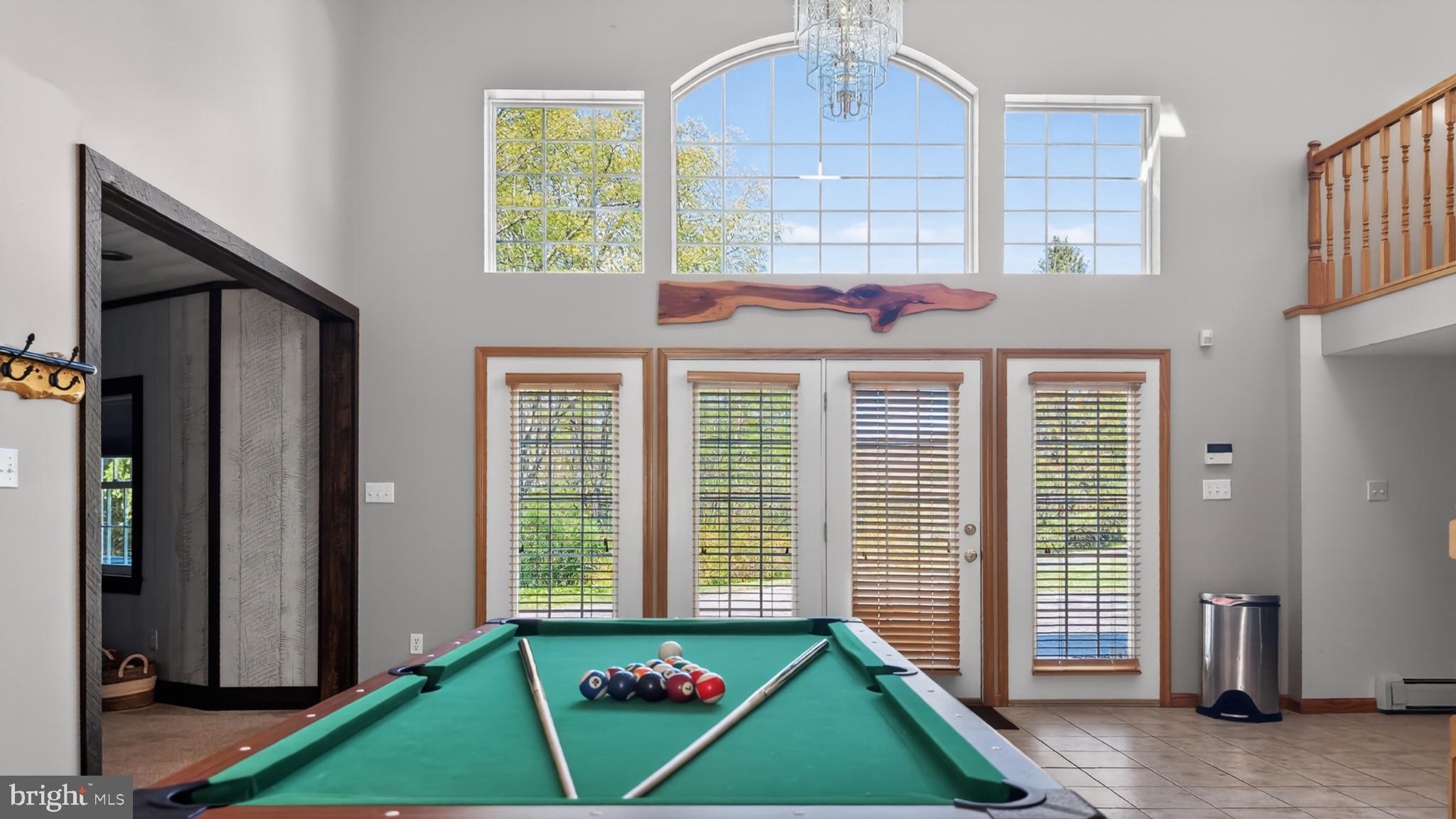 259 A A-Frame Road Coudersport, PA 16915 - Photo 127 of 130 Spacious game room with natural light.