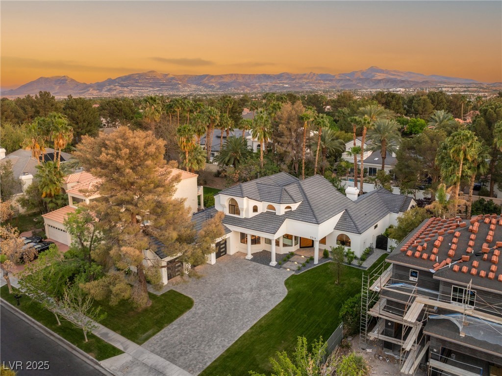 2316 Prometheus Court Henderson, NV 89074 - Photo 72 of 92 Aerial view at dusk featuring a mountain view