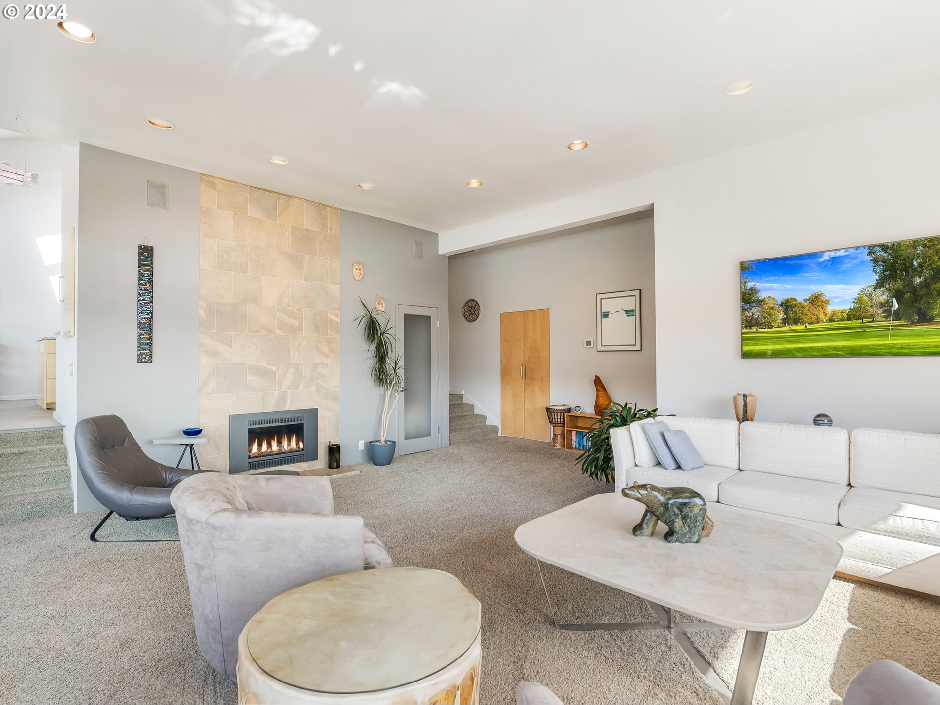 222 Southeast Spokane Street, Unit 3 Portland, OR 97202 - Photo 13 of 47 a living room with furniture and a rug