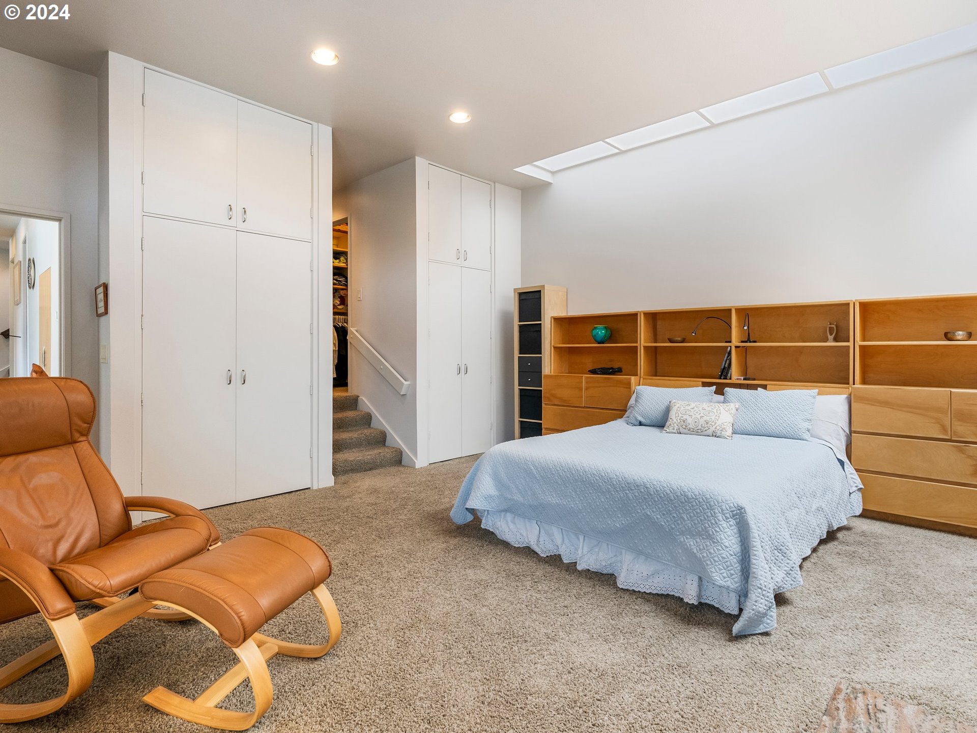 222 Southeast Spokane Street, Unit 3 Portland, OR 97202 - Photo 22 of 47 a bedroom with a bed and a closet