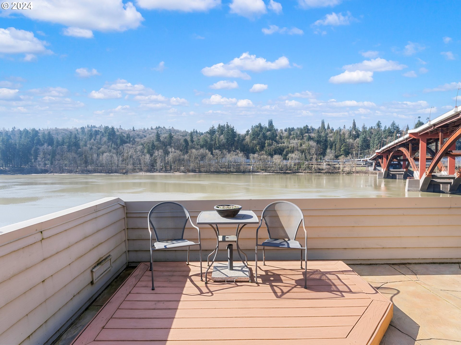 222 Southeast Spokane Street, Unit 3 Portland, OR 97202 - Photo 35 of 47 a view of a lake with furniture