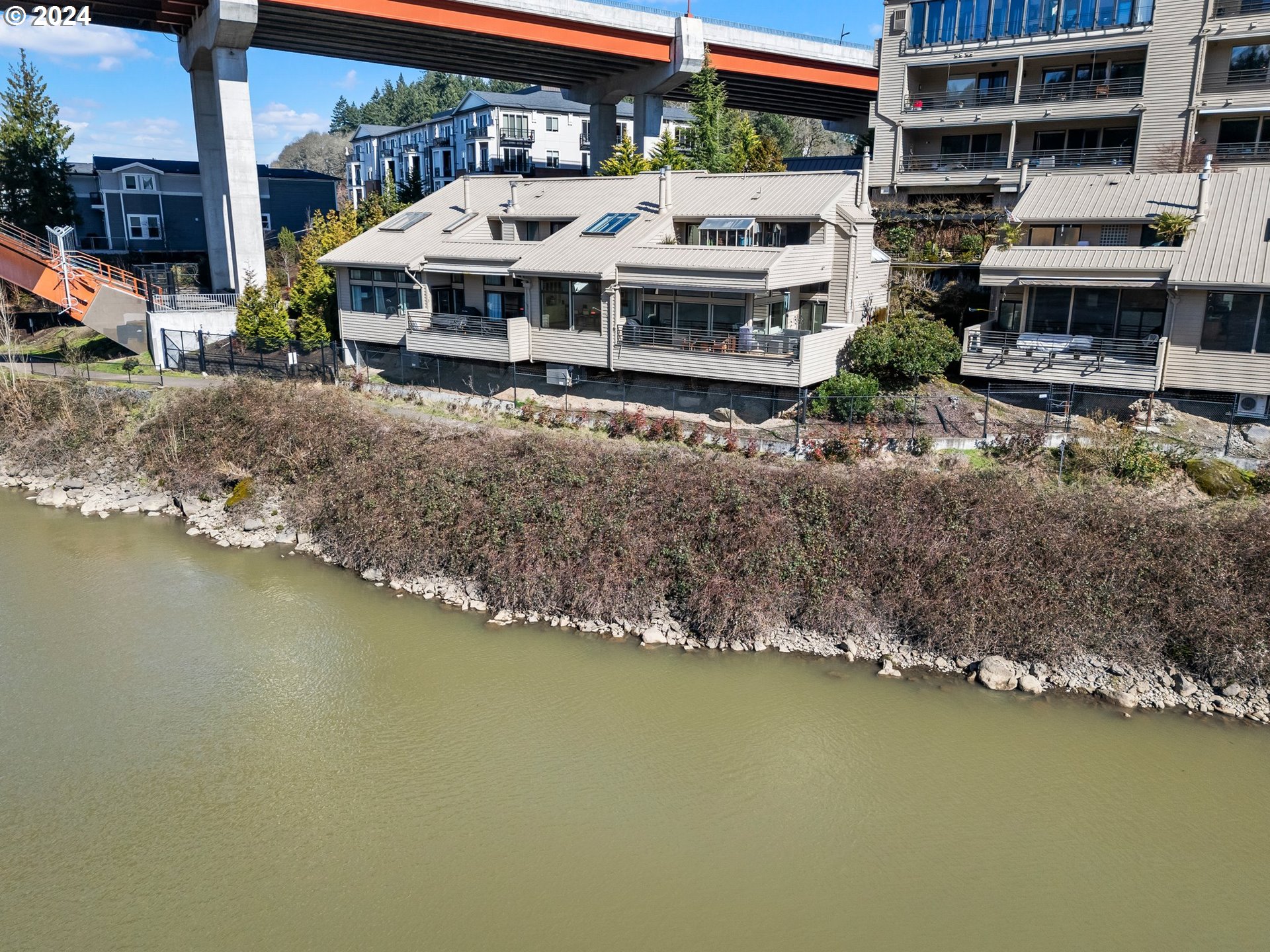 222 Southeast Spokane Street, Unit 3 Portland, OR 97202 - Photo 38 of 47 an aerial view of residential building with lake view and boat