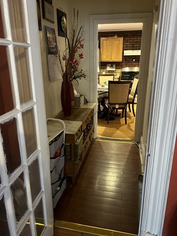 61 Forest Street Boston, MA 02119 - Photo 14 of 36 a view of a livingroom with furniture and a potted plant