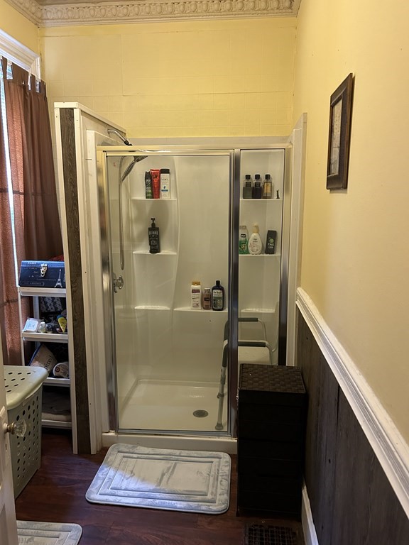 61 Forest Street Boston, MA 02119 - Photo 15 of 36 a bathroom with a shower