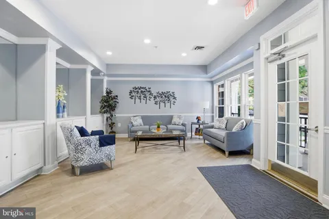 a view of a hallway with white walls