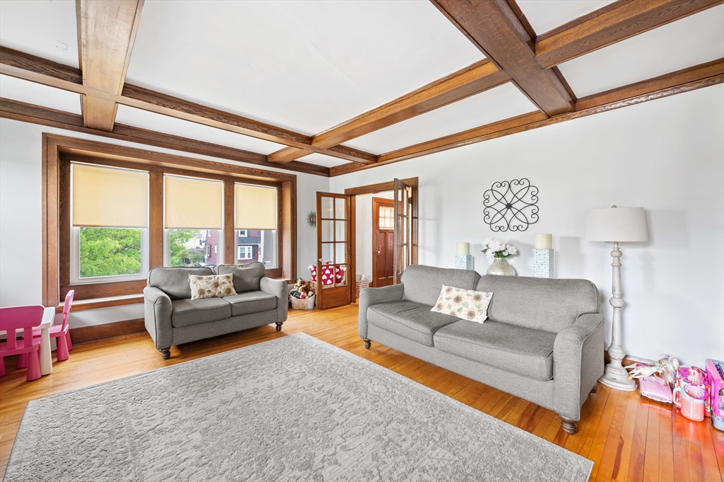 23 Devens Road Worcester, MA 01606 - Photo 23 of 42 a living room with furniture and a large window