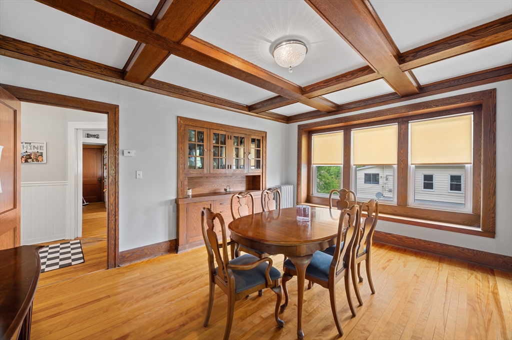 23 Devens Road Worcester, MA 01606 - Photo 24 of 42 a view of a dining room with furniture large windows and wooden floor