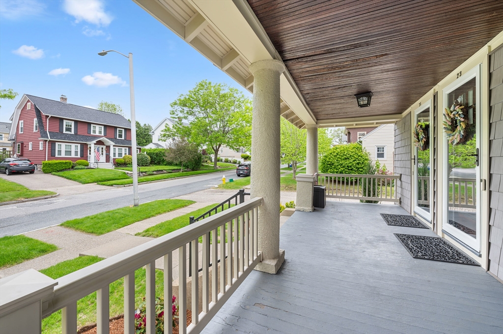 23 Devens Road Worcester, MA 01606 - Photo 3 of 42 a view of a porch with wooden floor and fence