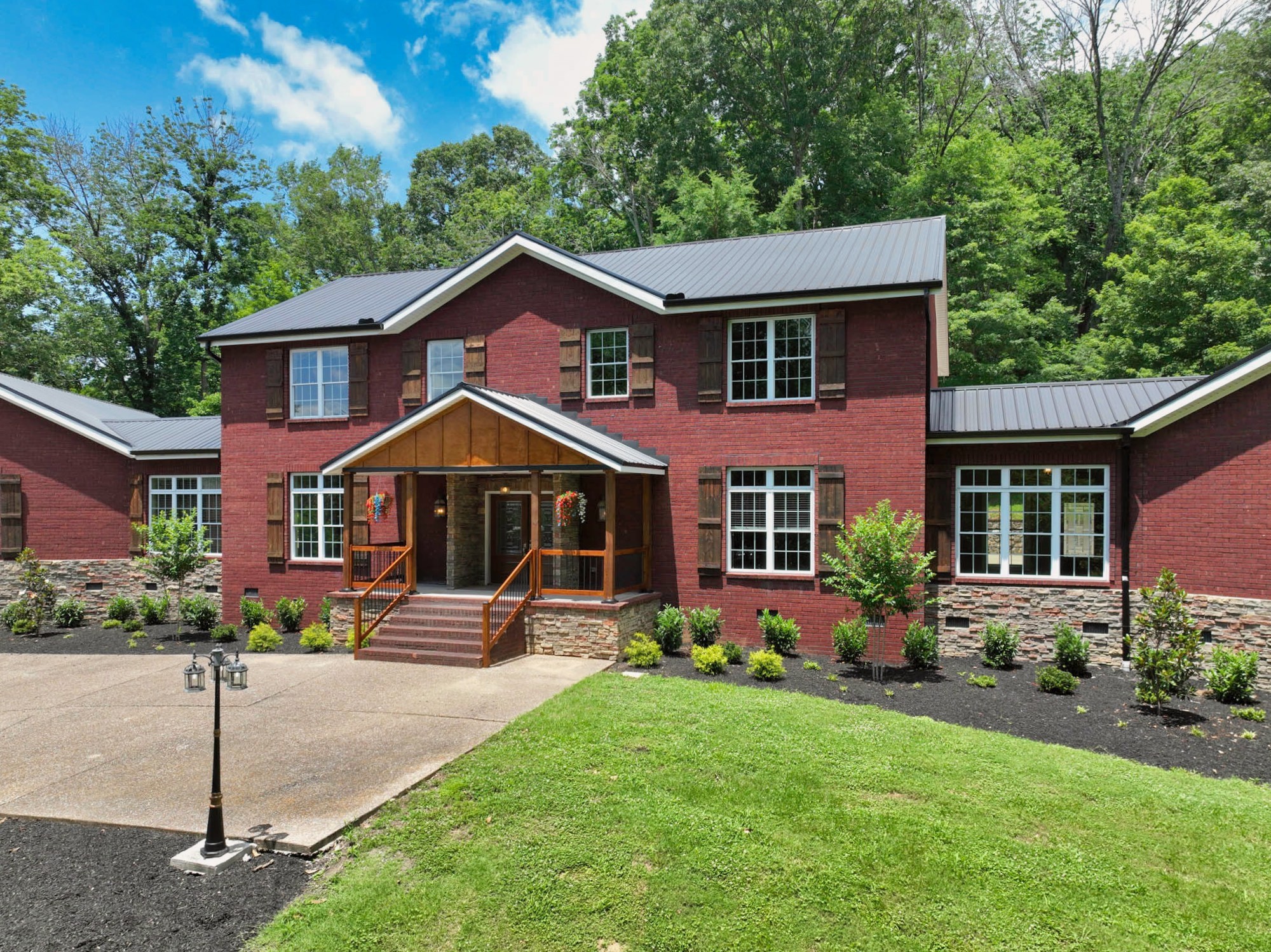 125 Happy Hollow Road Goodlettsville, TN 37072 - Photo 2 of 92 a front view of a house with a yard
