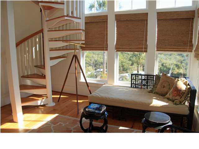 42 Founders Lane Watersound, FL 32461 - Photo 12 of 33 a living room with table chairs and a large window