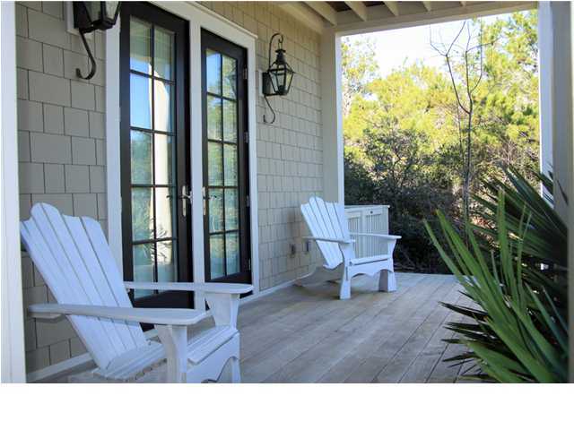 42 Founders Lane Watersound, FL 32461 - Photo 19 of 33 a outdoor living space with furniture and garden view