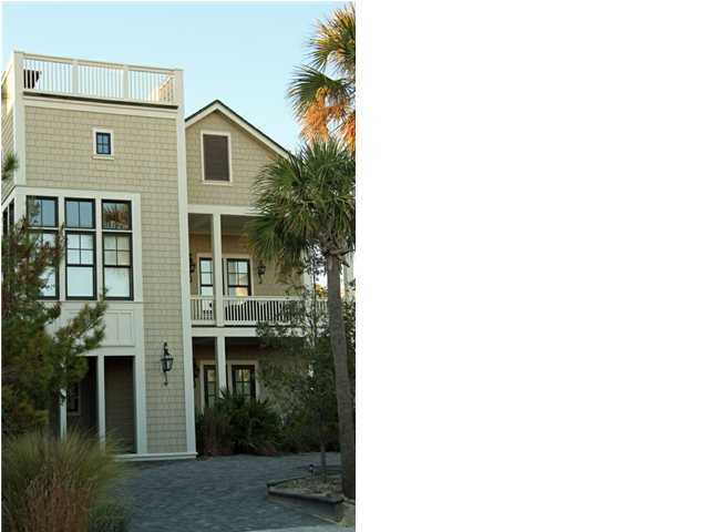 42 Founders Lane Watersound, FL 32461 - Photo 28 of 33 a view of a house with a yard and potted plants