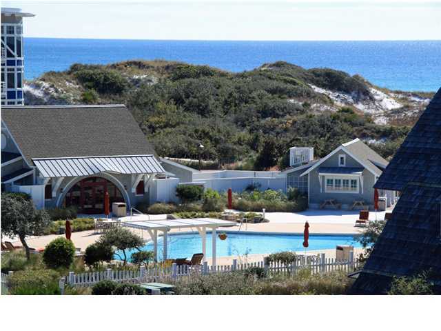42 Founders Lane Watersound, FL 32461 - Photo 29 of 33 a swimming pool with outdoor seating and yard