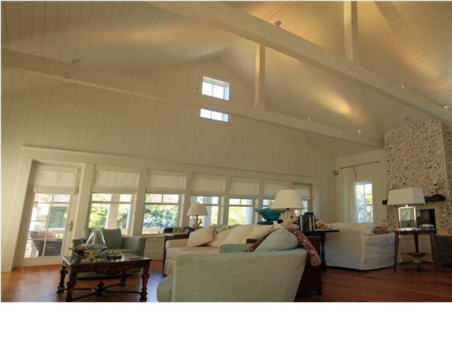 42 Founders Lane Watersound, FL 32461 - Photo 7 of 33 a living room with furniture and a large window