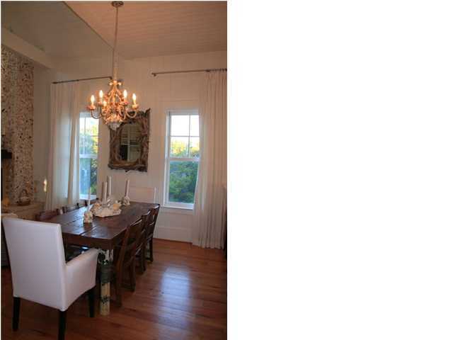 42 Founders Lane Watersound, FL 32461 - Photo 9 of 33 a view of a dining room with furniture and window