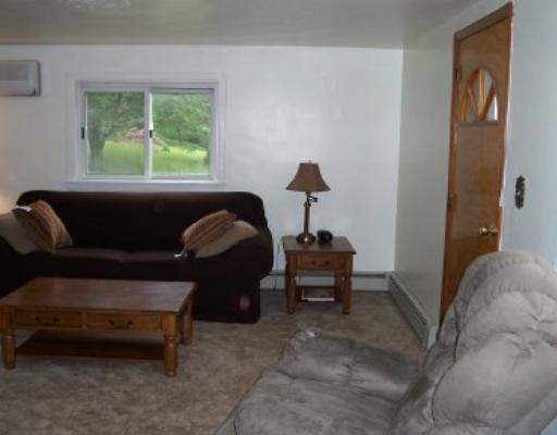 176 Burrell Hill Road Penn, PA 15675 - Photo 8 of 16 Living Room.
