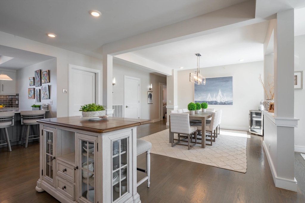 78 Thatcher Road, Unit 6 Gloucester, MA 01930 - Photo 11 of 41 a view of a dining room with furniture and wooden floor