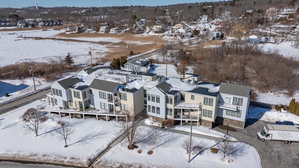 78 Thatcher Road, Unit 6 Gloucester, MA 01930 - Photo 29 of 41 an aerial view of residential houses with outdoor space