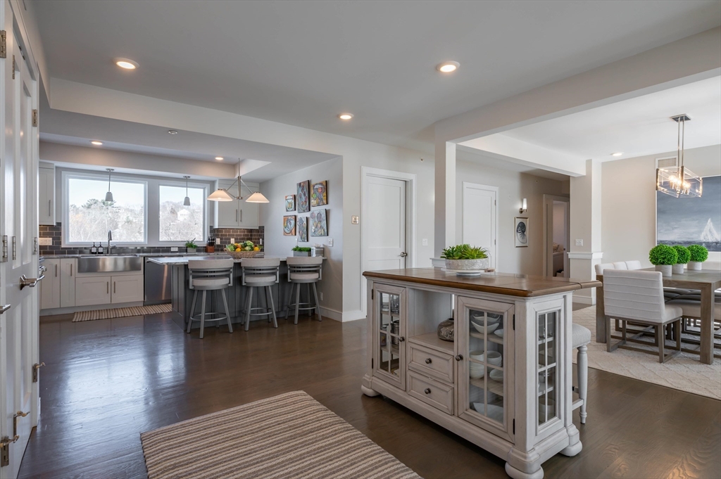 78 Thatcher Road, Unit 6 Gloucester, MA 01930 - Photo 6 of 41 a view of a dining room with furniture and wooden floor