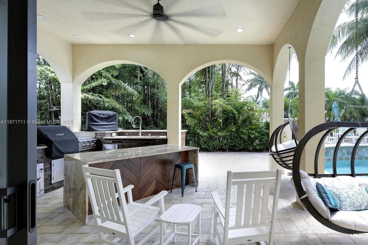 17838 Monte Vista Drive Boca Raton, FL 33496 - Photo 3 of 66 a living room with furniture and a large window