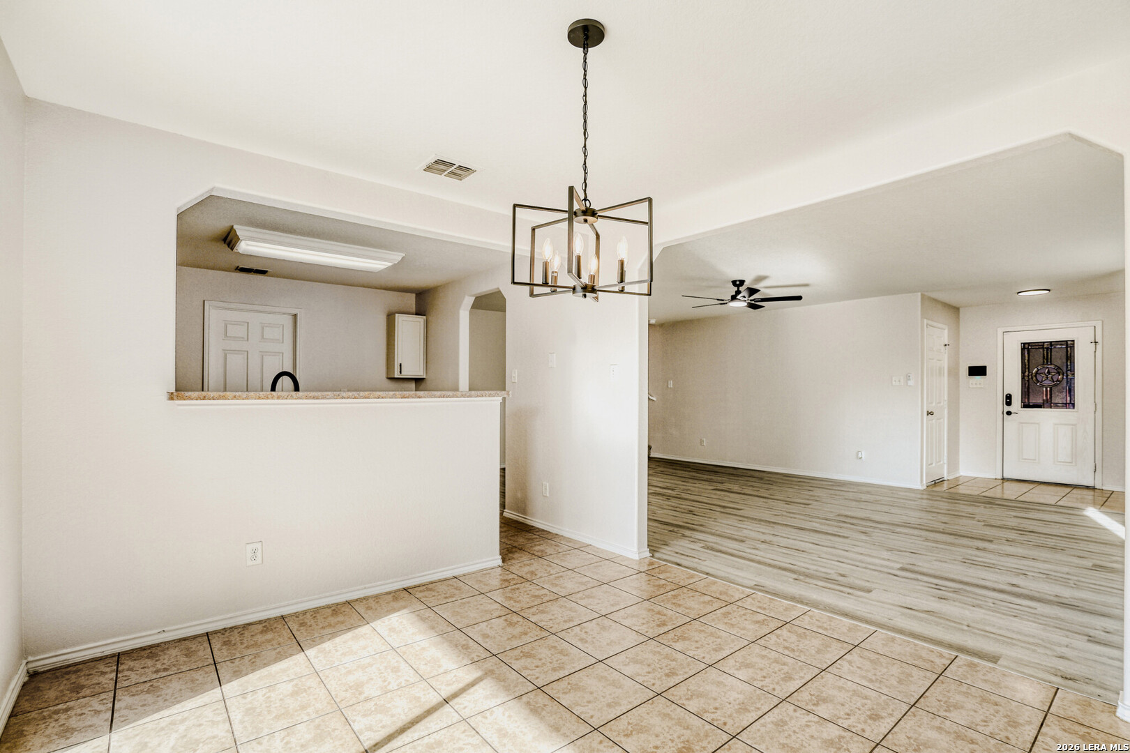312 Passerina Spur Schertz, TX 78154 - Photo 12 of 26 a view of a kitchen with sink and mirror