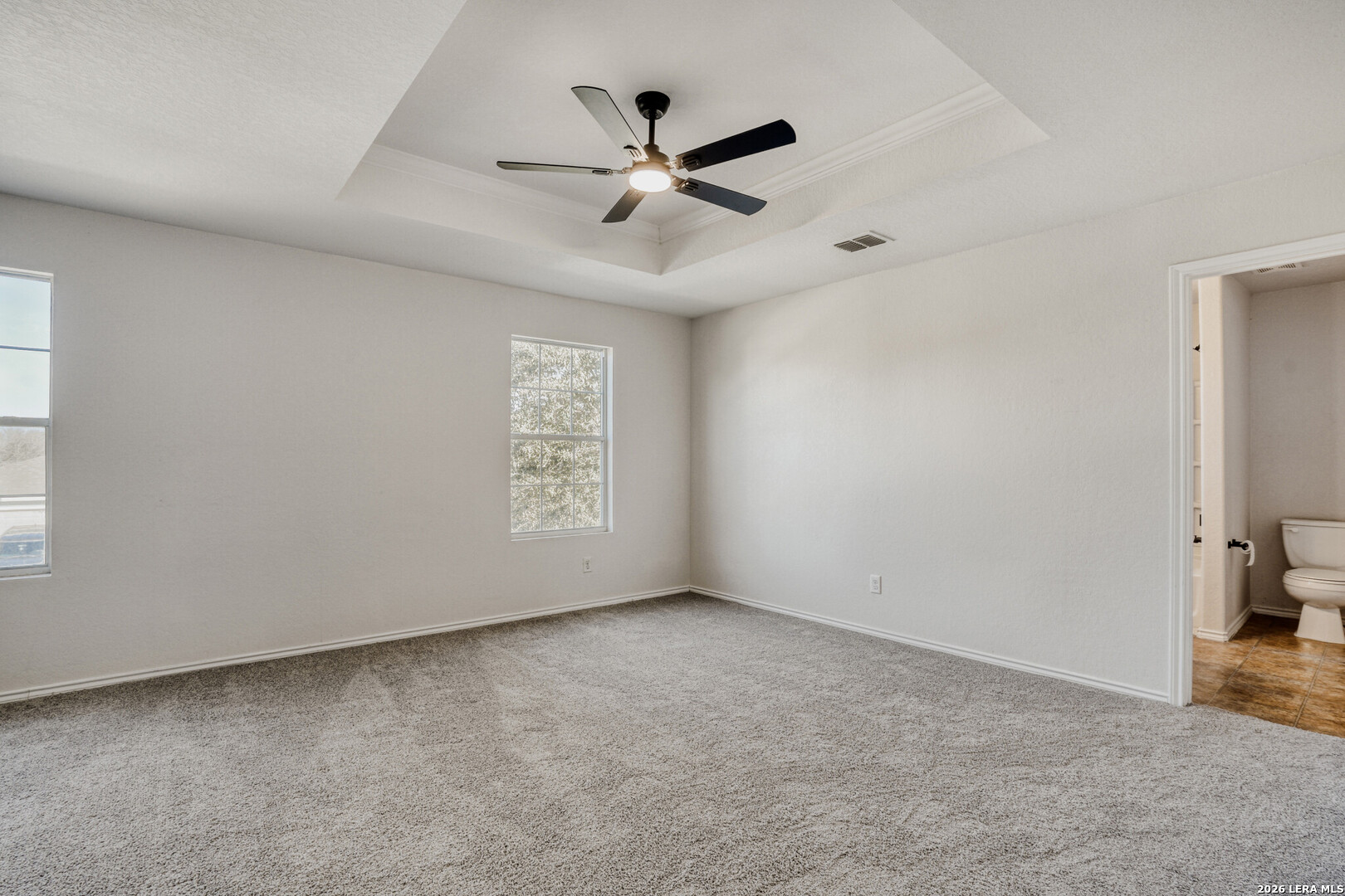 312 Passerina Spur Schertz, TX 78154 - Photo 22 of 26 wooden floor in an empty room and a window