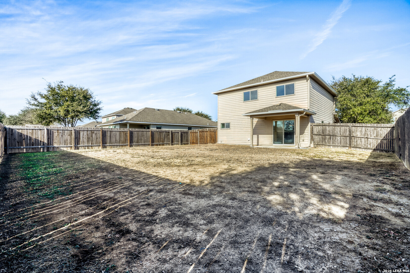 312 Passerina Spur Schertz, TX 78154 - Photo 26 of 26 a front view of a house with a yard