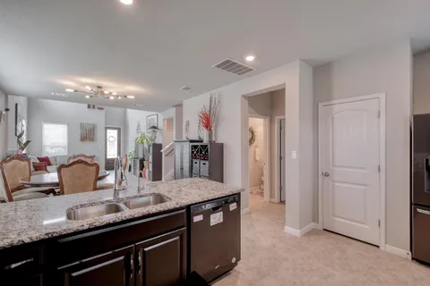 a view of a swimming pool with a lounge chair