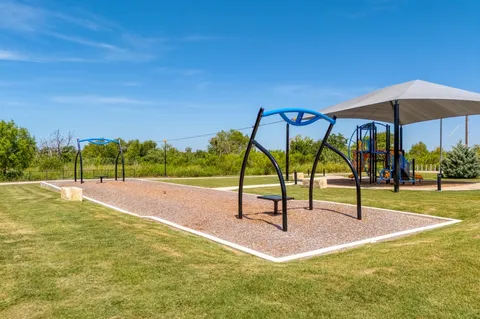 a view of a backyard with sitting area