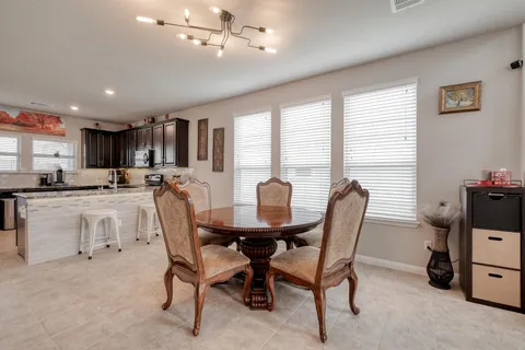 a view of kitchen with breakfast area