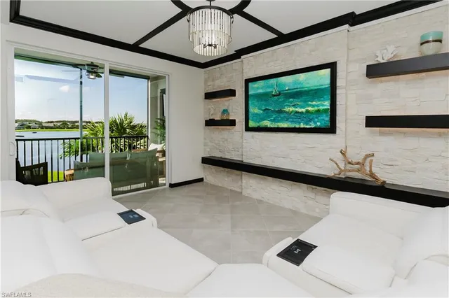 a bedroom with bed and a night stand