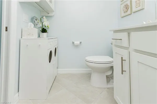 a bathroom with a sink and toilet