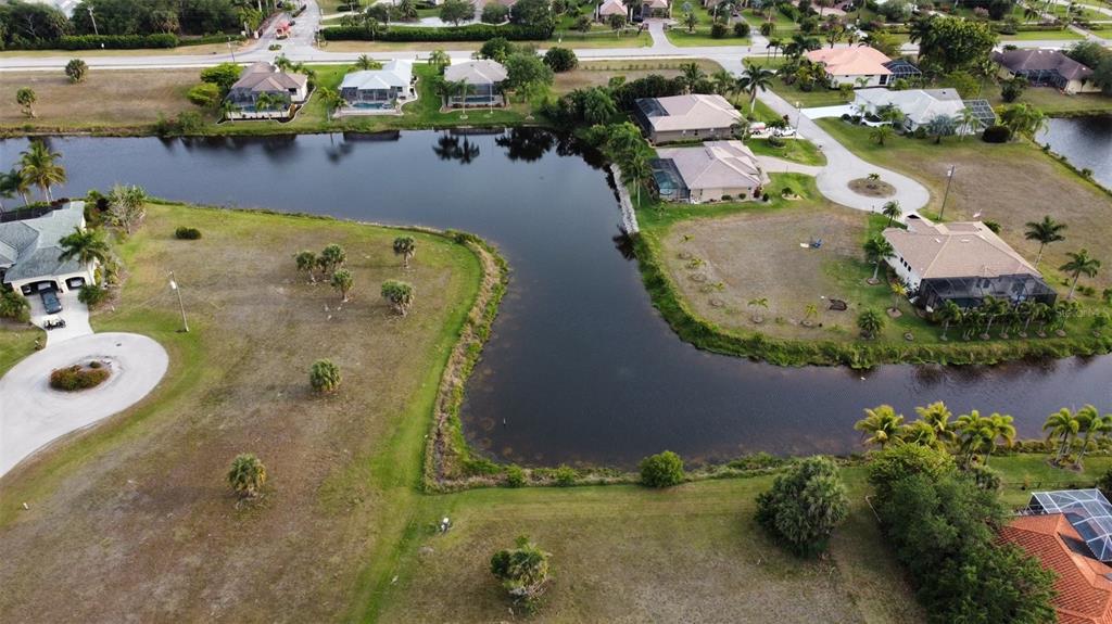 23999 Cedar Rapids Road Punta Gorda, FL 33955 - Photo 2 of 12 an aerial view of a house with outdoor space and lake view