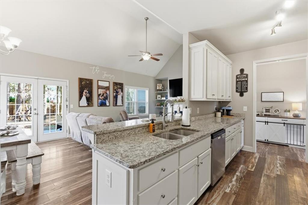 59 Round Rock Circle Northeast Rome, GA 30161 - Photo 12 of 46 a kitchen with granite countertop a sink and cabinets