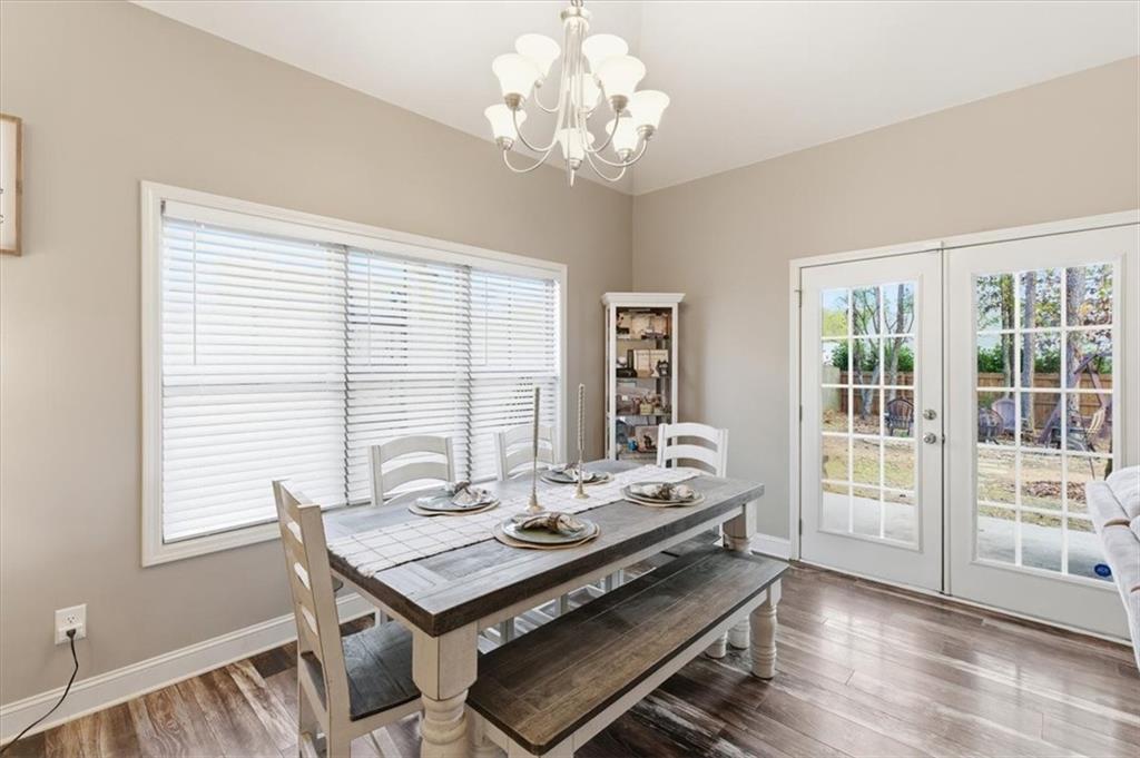 59 Round Rock Circle Northeast Rome, GA 30161 - Photo 13 of 46 a view of a dining room with furniture window and wooden floor
