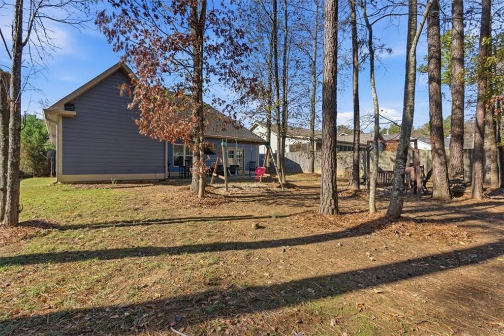 59 Round Rock Circle Northeast Rome, GA 30161 - Photo 36 of 46 a front view of a house with a yard