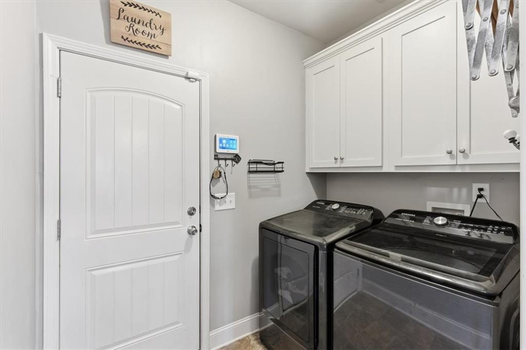 59 Round Rock Circle Northeast Rome, GA 30161 - Photo 10 of 46 a kitchen with a refrigerator and cabinets