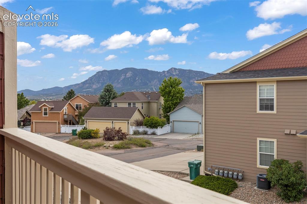 1563 Monterey Road, Unit D Colorado Springs, CO 80910 - Photo 16 of 22 a view of a house with a yard