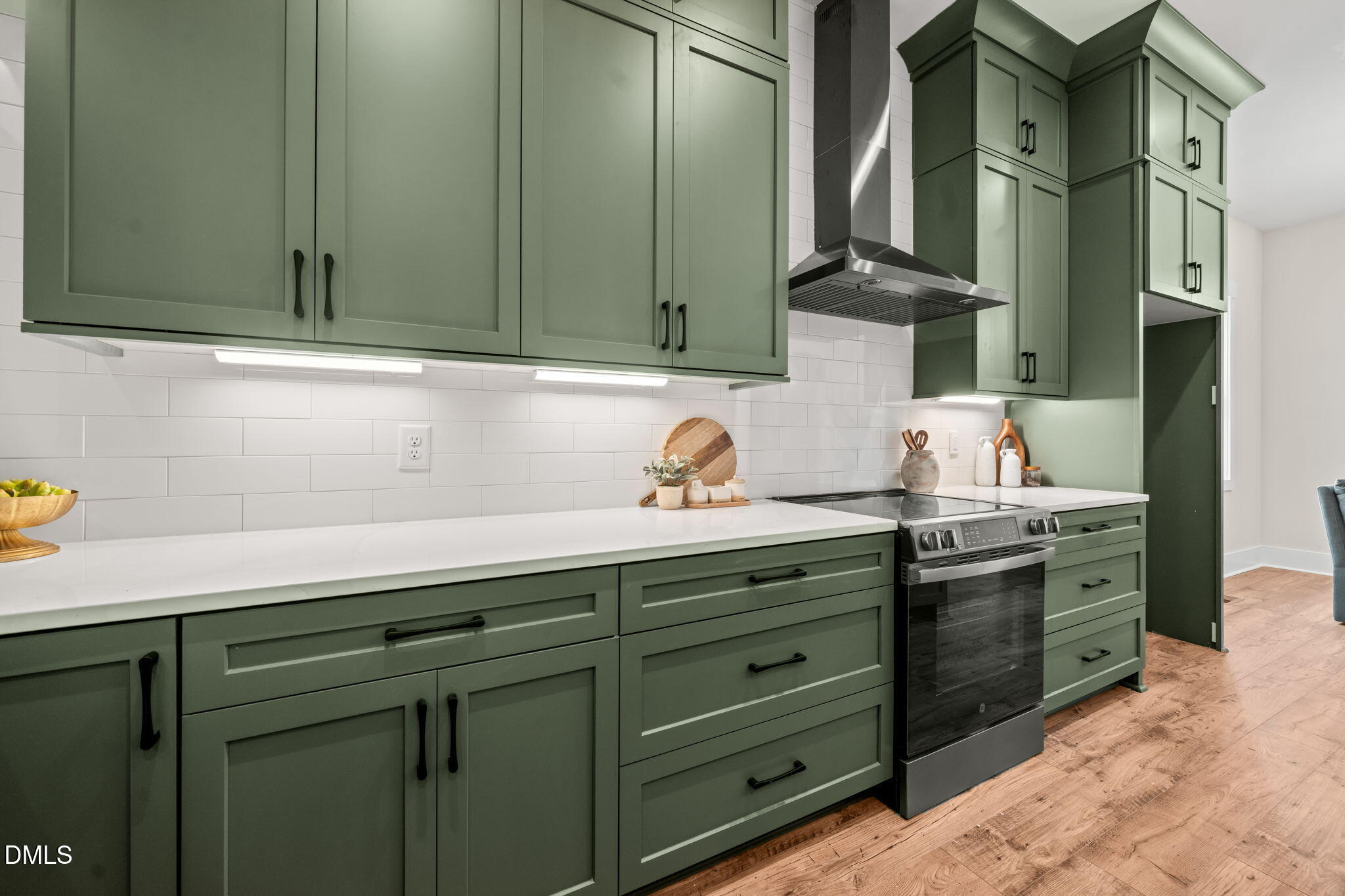 400 Pilot Ridge Road Zebulon, NC 27597 - Photo 18 of 51 a kitchen with stainless steel appliances granite countertop a sink a stove and cabinets