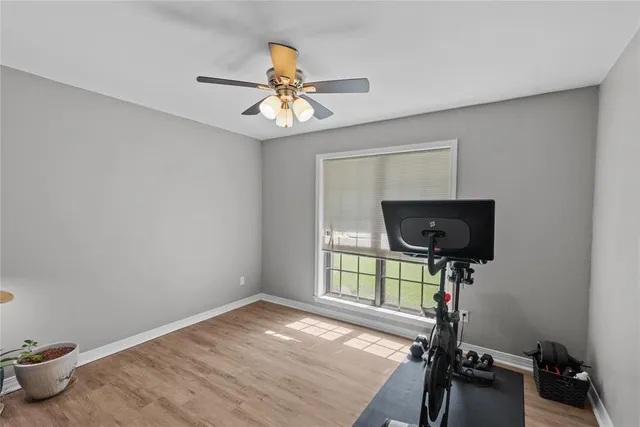 a view of room with a flat screen tv and a window