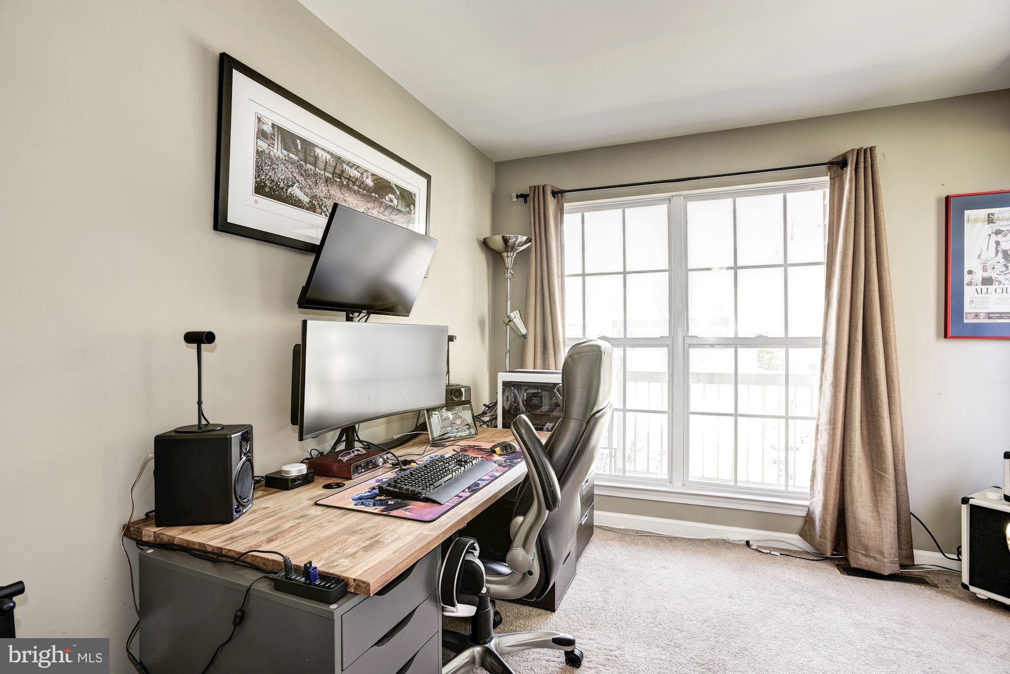 12085 Trumbull Way, Unit 20851 Reston, VA 20190 - Photo 19 of 32 2nd bedroom features bright windows