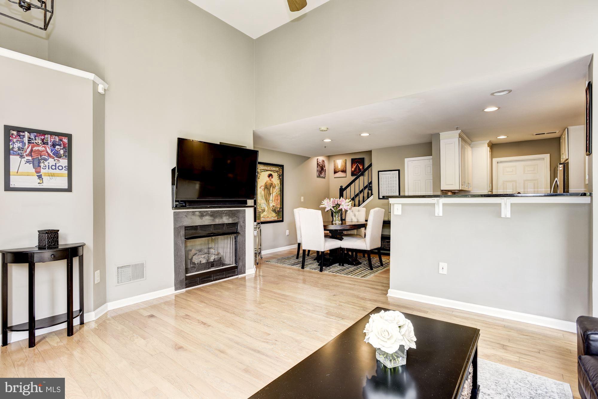 12085 Trumbull Way, Unit 20851 Reston, VA 20190 - Photo 7 of 32 Open floorpan with gas fireplace