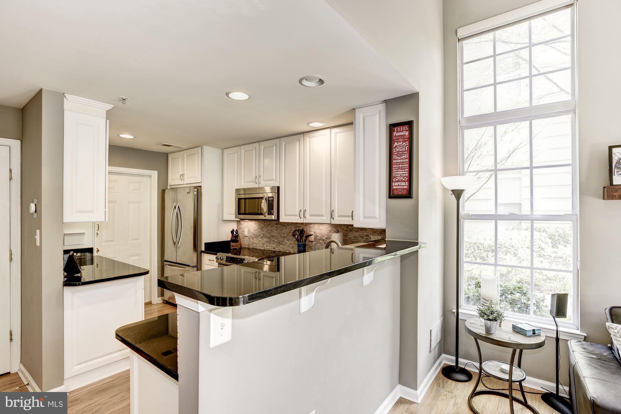 12085 Trumbull Way, Unit 20851 Reston, VA 20190 - Photo 9 of 32 Fully renovated kitchen
