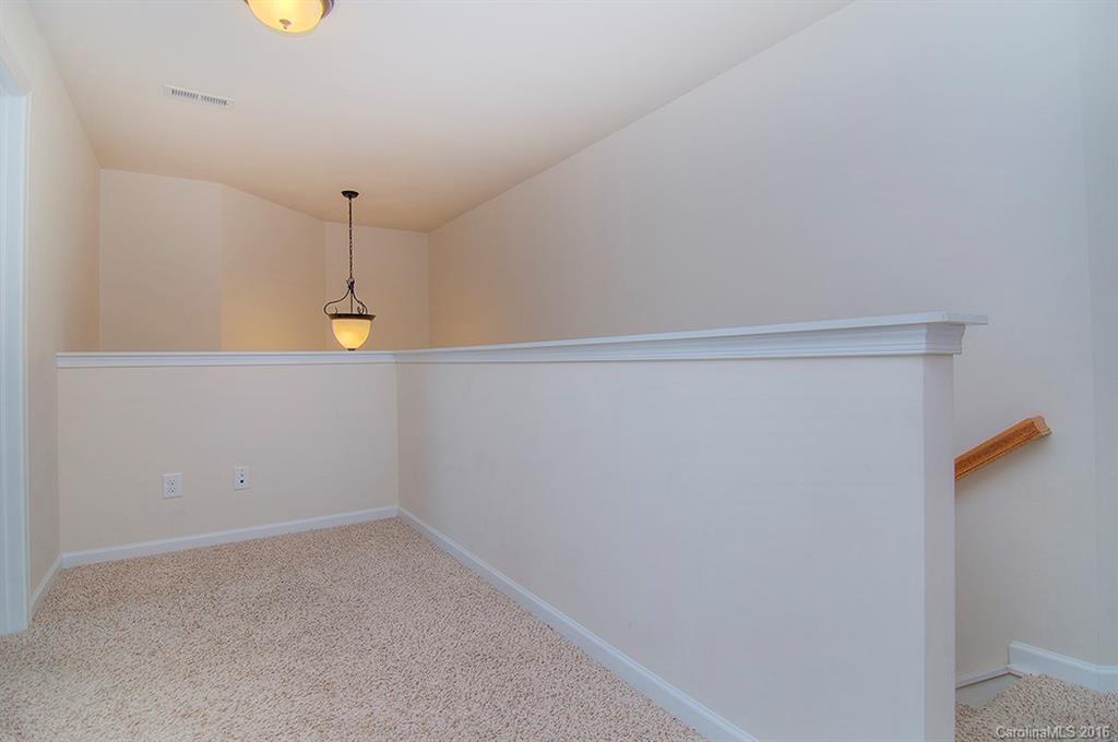 129 Inlet Point Drive, Unit 72 Tega Cay, SC 29708 - Photo 8 of 20 a view of an empty room